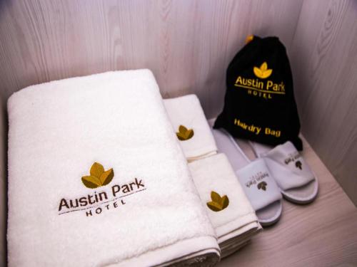a group of towels sitting on top of a table at Austin Park Hotel in Johor Bahru