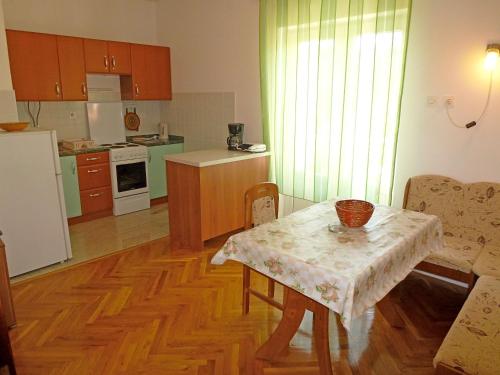 Kuchyň nebo kuchyňský kout v ubytování Apartments Jelka
