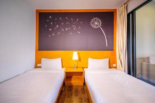Ein Bett oder Betten in einem Zimmer der Unterkunft Nova Highlands Hotel