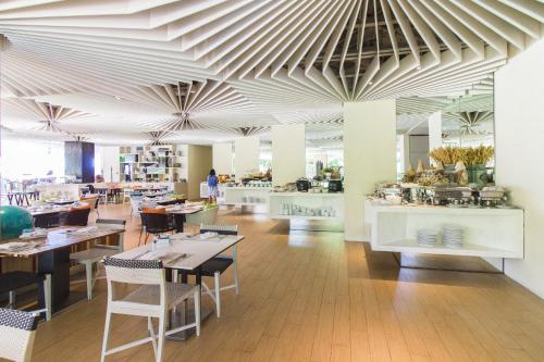 Um restaurante ou outro lugar para comer em Veranda Resort Pattaya - MGallery Collection, Accor Hotel