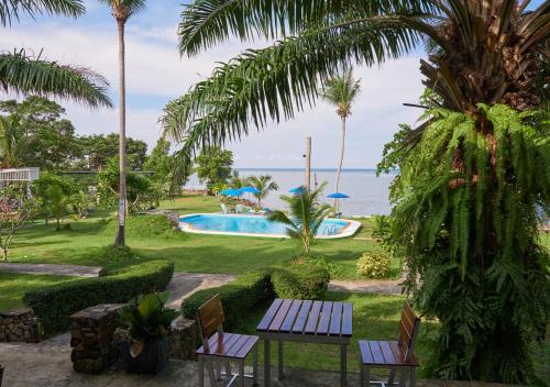 a view of the ocean from the patio of a resort at Elephant Bay Resort in Ko Chang
