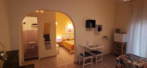 A bed or beds in a room at Il Pianoforte B&B