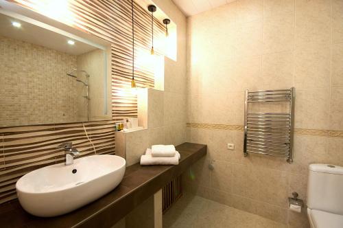 Ett badrum på Hotel Livin