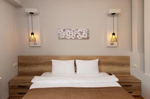 Ein Bett oder Betten in einem Zimmer der Unterkunft Hotel Livin