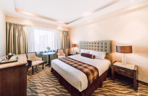 Katil atau katil-katil dalam bilik di Chinggis Khaan Hotel