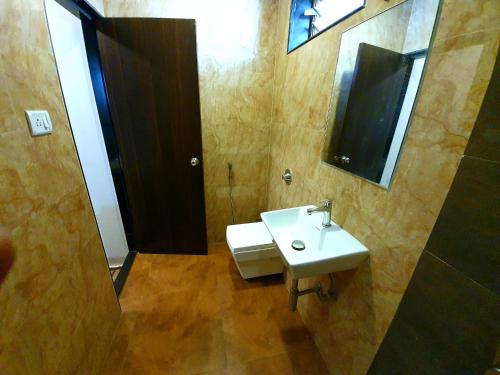 Ванная комната в Hotel Shambuji