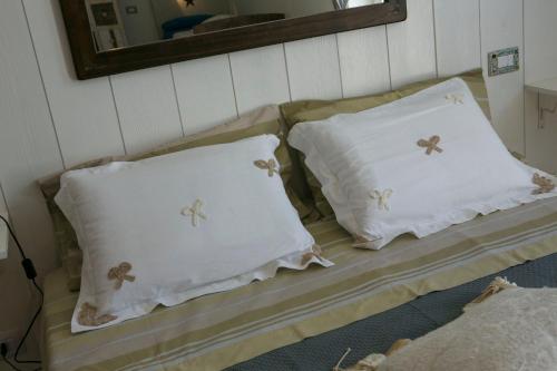 Postel nebo postele na pokoji v ubytování A Casa di LoLu