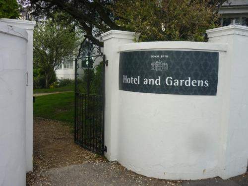 a sign that reads hotel and gardens on a gate at Royal Bath Hotel & Spa Bournemouth in Bournemouth