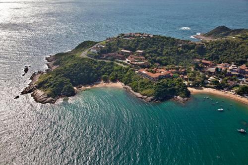 an aerial view of a small island in the ocean at Colonna Park Hotel in Búzios