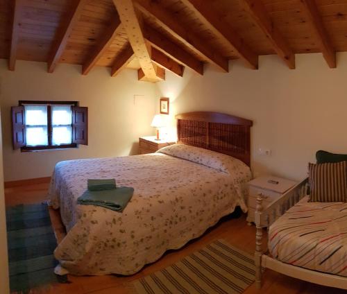 Кровать или кровати в номере Vivienda Vacacional Casa Abuela Herminia