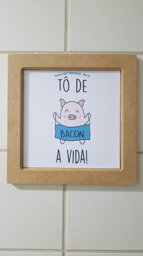 a picture of a sign on a wall with a pig at Prive das Thermas - 301B in Caldas Novas
