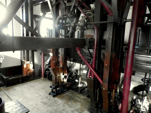 a room with a bunch of pipes in a building at Antiga Moagem in Vimieiro