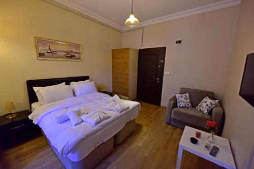 Letto o letti in una camera di Sunshine Taksim Suite