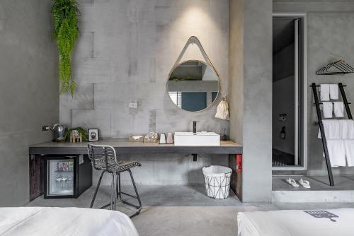 Postel nebo postele na pokoji v ubytování Loft Inn