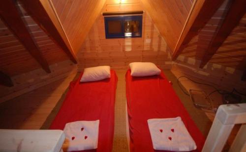 Cama o camas de una habitación en צימר בגבעה