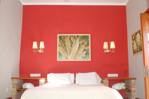 Een bed of bedden in een kamer bij La Casona de Yaiza