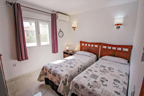 Cama o camas de una habitación en Gila - sea view villa with private pool in Benissa