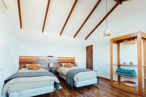 Кровать или кровати в номере Ecolodge La Estancia