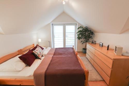 Posteľ alebo postele v izbe v ubytovaní Penzion Modul
