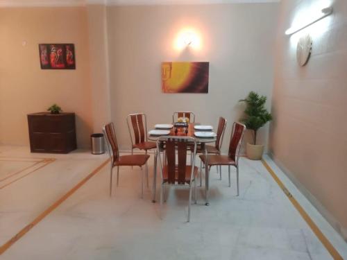 Posezení v ubytování Pamposh Guest House, Gurgaon