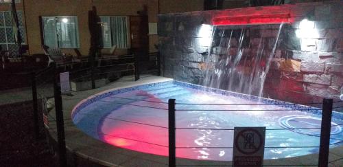 Swimmingpoolen hos eller tæt på Complejo Ali Lafken