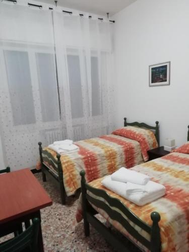 Cama o camas de una habitación en Affittacamere Mark