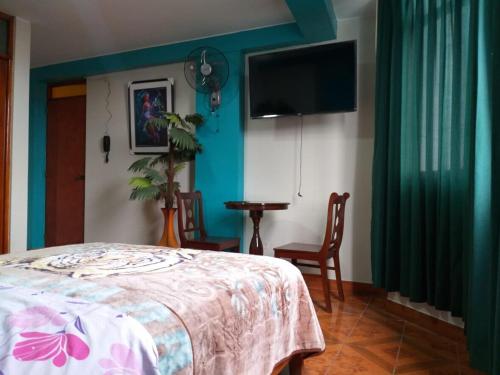TV a/nebo společenská místnost v ubytování Hotel Camino Real