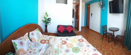 Postel nebo postele na pokoji v ubytování Hotel Camino Real
