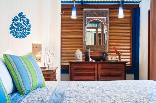 Postel nebo postele na pokoji v ubytování Blue Osa Beach Resort & Spa