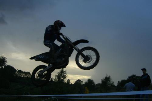 a person doing a trick on a dirt bike at Dom Wczasowy Pięciu Pomostów in Czaplinek