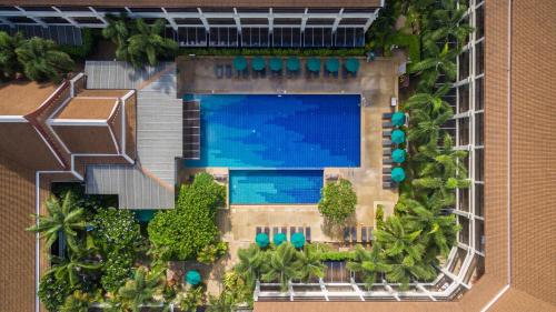 an overhead view of a swimming pool at a resort at Deevana Patong Resort & Spa - SHA Extra Plus in Patong Beach