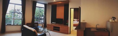 TV a/nebo společenská místnost v ubytování Sena House