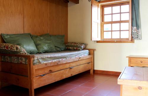 Ένα ή περισσότερα κρεβάτια σε δωμάτιο στο Cosy Apartment Seia 25 m² Fireplace