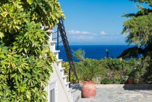 a view of the ocean from a house at Fiore Hill Sea View Studios in Vasilikos