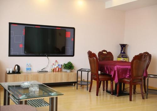 TV a/nebo společenská místnost v ubytování Thank Inn Plus Hotel Shandong Qingdao Jimo Development Zone New Government