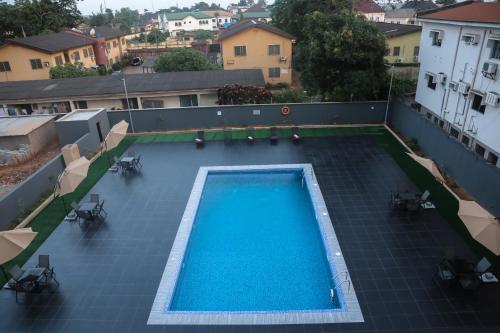 an overhead view of a swimming pool on a building at BON Hotel Ikeja Residence in Ikeja