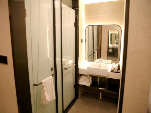 Et badeværelse på Thank Inn Plus Hotel Shandong Jinan Jiyang HuaYang Road