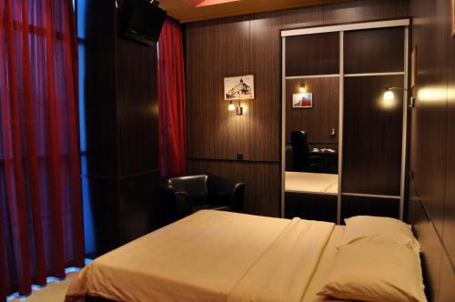 Cama o camas de una habitación en Hotel Fortuna