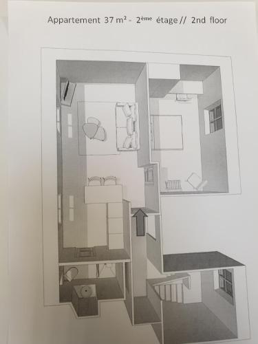 a drawing of a floor plan of a house at Au Loup Historic Apartments in Bayeux