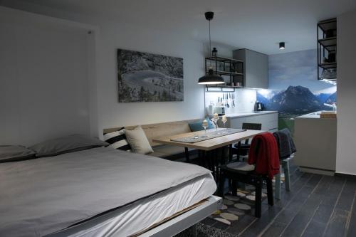Katil atau katil-katil dalam bilik di Apartma Verdi Bc