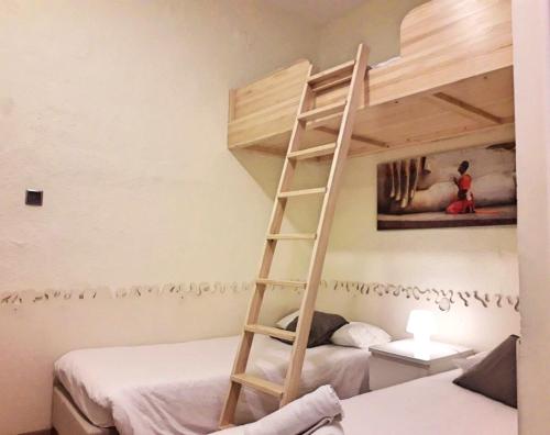 Postel nebo postele na pokoji v ubytování Itaca Hostel