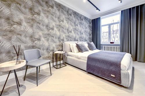Кровать или кровати в номере Vilnius Apartments & Suites – Old Town