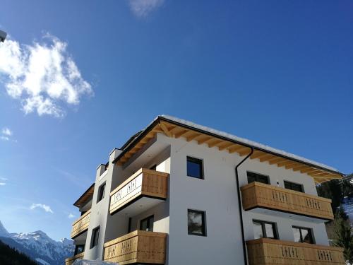 a building with boxes on top of it at Waidmannsruh Appartements in Gerlos