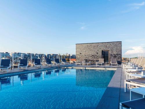 Bazén v ubytování Mercure Blankenberge nebo v jeho okolí