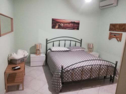 Ένα ή περισσότερα κρεβάτια σε δωμάτιο στο B&B Serenità
