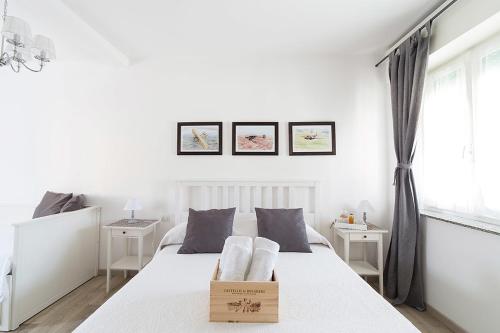 Кровать или кровати в номере Il Giuelìn Malpensa B&B