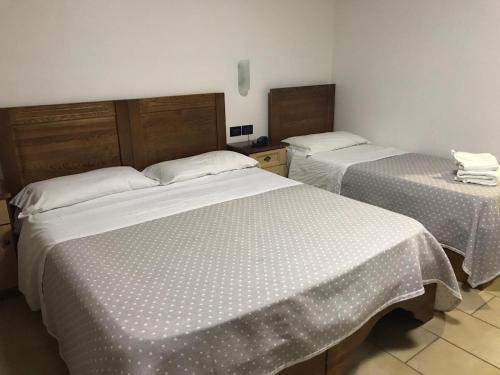 Postel nebo postele na pokoji v ubytování Hotel Fly
