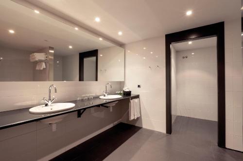 Koupelna v ubytování Wuau! Hotel Galanthus & Spa