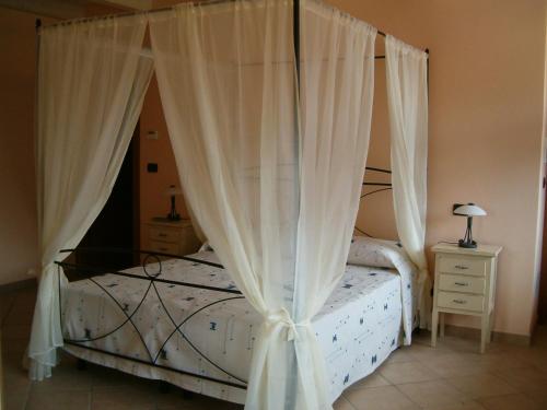 Cama o camas de una habitación en Agriturismo Isorella