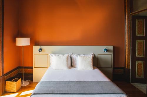 Letto o letti in una camera di Menina Colina Guesthouse